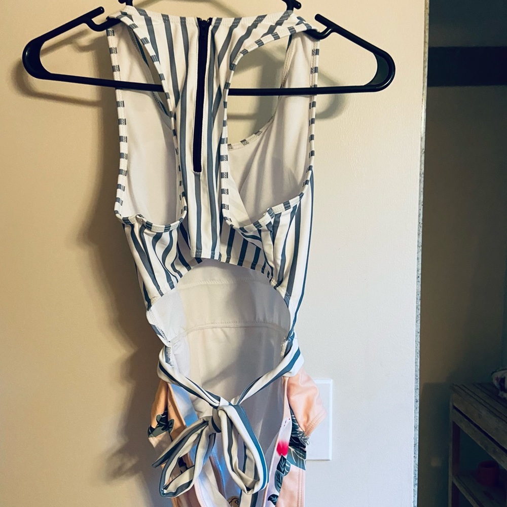 Floral/stripe. Super cute. Never worn but no tags